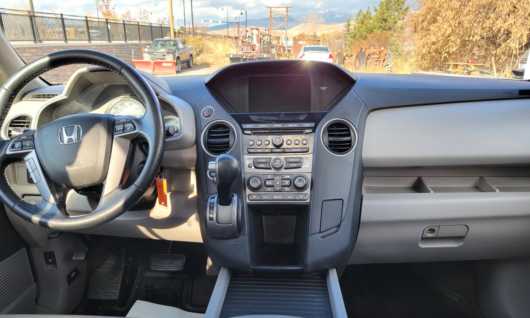 2015 White /Gray Honda Pilot EX-L AWD EX-L (5FNYF4H58FB) with an 3.5L V6 SOHC 24V engine, 5-Speed Automatic transmission, located at 450 N Russell, Missoula, MT, 59801, (406) 543-6600, 46.874496, -114.017433 - All Wheel Drive. Automatic Transmission. Power Heated Leather Seats. Power Sunroof. 3rd Row Seating. Air. Cruise. Tilt. Bluetooth. AM FM XM CD Player. Backup Camera. - Photo#16